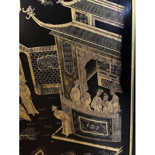 421 - A mid 20the century Chinese lacquer panel with gilt decoration of a domestic scene