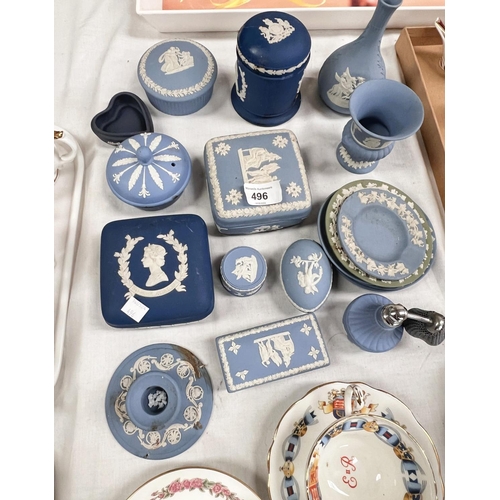 496 - A collection of blue Wedgwood Jasperware including commemorative and a large collection of early 20t... 