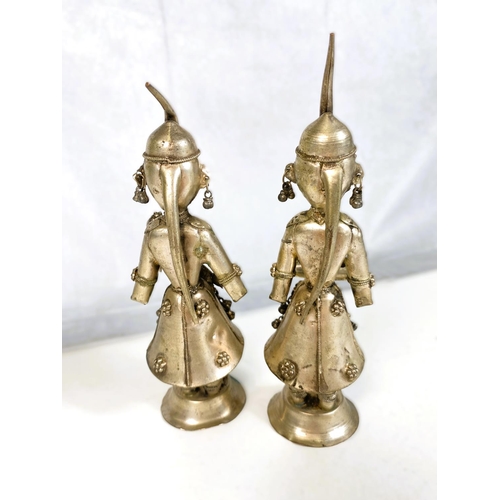 407 - A pair of oriental white coloured metal figures playing instruments, ht. 20cm