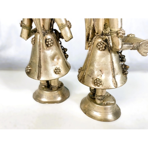 407 - A pair of oriental white coloured metal figures playing instruments, ht. 20cm