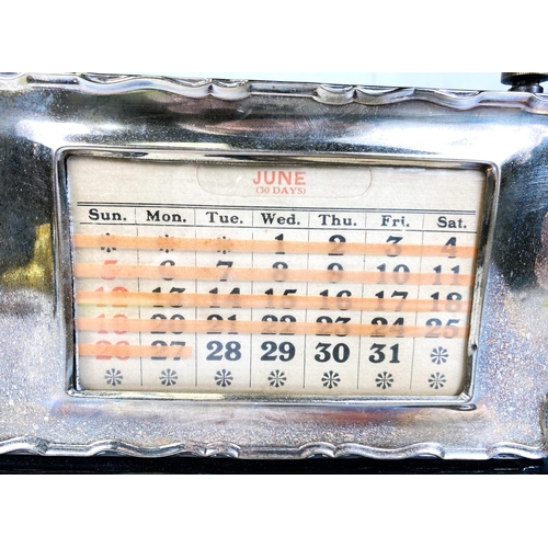 735 - A hallmarked silver desk top perpetual calendar, Birmingham 1925