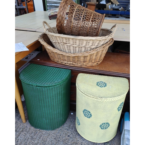 1001 - A Lloyd loom style linen basket, another similar, a vintage dog bed and other baskets