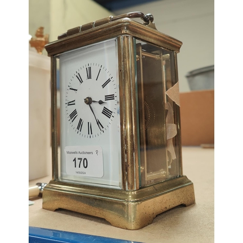 170 - A 19th century large brass carriage clock with timepiece movement, height 14cm