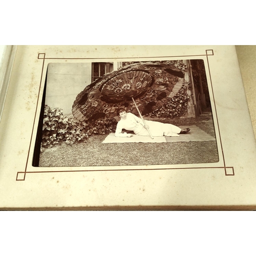 219 - A MOST INTERESTING COUNTRY ESTATE photograph album to include images of skeletons, bicycle riders, a... 