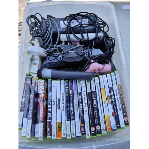 313 - A Xbox 360 and a good selection of games