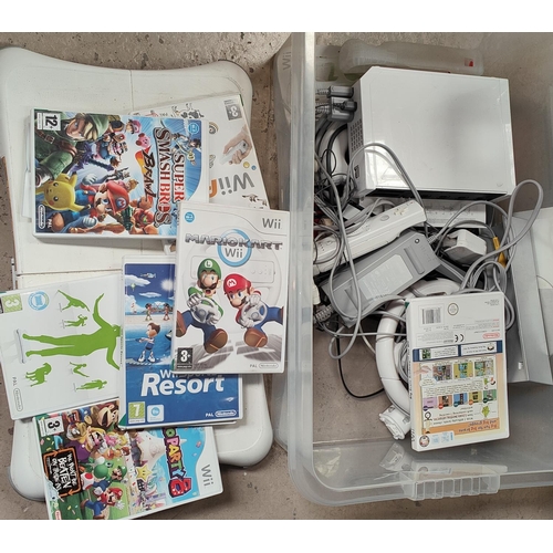 314 - A Nintendo Wii and a collection of games