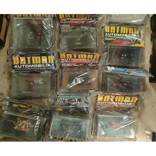 389 - Batman: 20 Collectable Batman related vehicles with magazines inside packaging