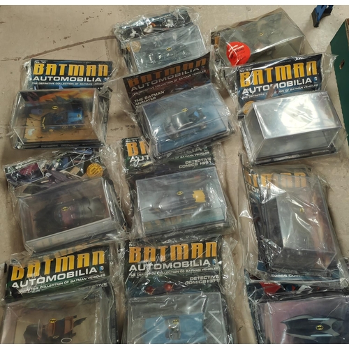 389 - Batman: 20 Collectable Batman related vehicles with magazines inside packaging