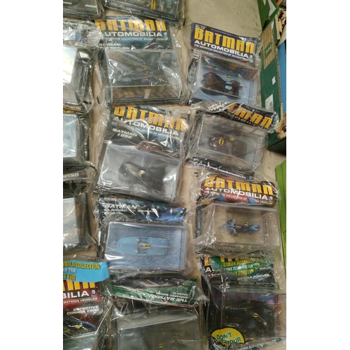 390 - Batman: 20 Collectable Batman related vehicles with magazines inside packaging