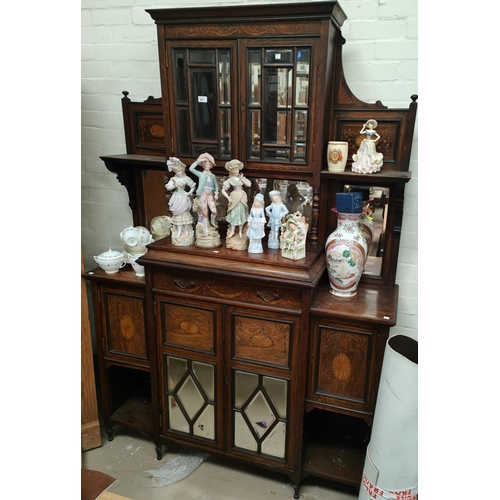 887 - A 19th century full height rosewood side cabinet with mirror back and extensive marquetry inlay, the... 