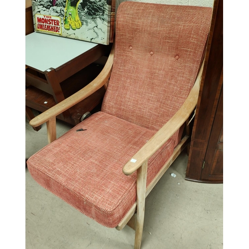 960A - A 1960's lightwood cable sprung armchair in red