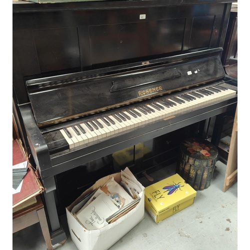 987 - An iron framed overstrung upright piano in ebonized case by Rosener