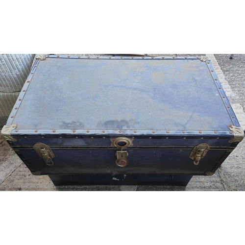 995 - A blue cabin trunk and a metal cabin trunk