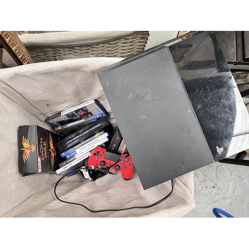 312 - A PS4 and a collection of PS2 and later games