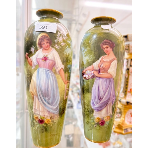 591 - A pair of Royal Bonn porcelain vases of baluster form, hand painted with young women with flowers in... 