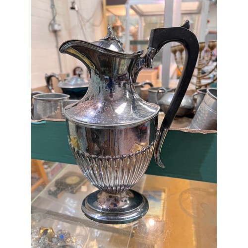 729 - A silver plated claret jug and a selection of silver plate and pewter