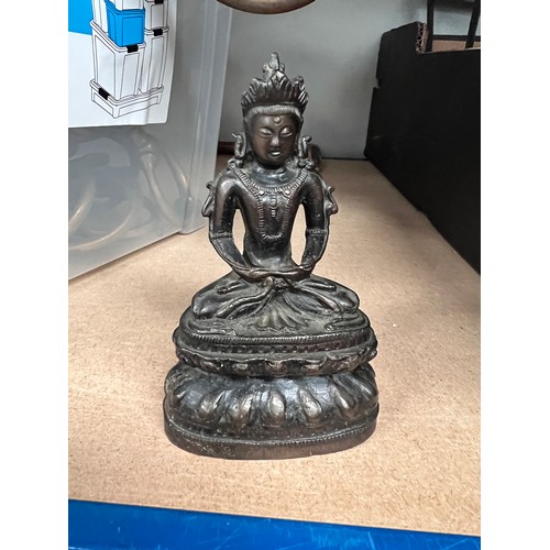 84 - A bronze buddha figure, a novelty money box golf related; 2 bronze candlesticks.*These items are lis... 