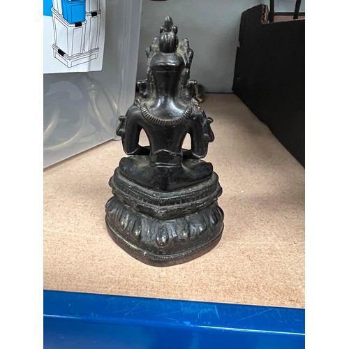 84 - A bronze buddha figure, a novelty money box golf related; 2 bronze candlesticks.*These items are lis... 