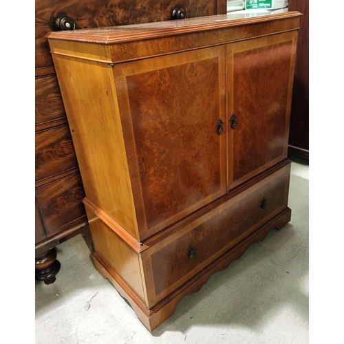 930 - A reproduction mahogany serpentine front side table with two frieze drawers and cross banded burr wa... 