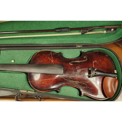 193 - A VIOLIN, full size with 2 bows, 2 piece back 36cm, one bow indistinctly signed, figured walnut 