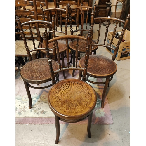 945 - A set of five 1930's Bentwood spindle back dining chairs, with patterned seat