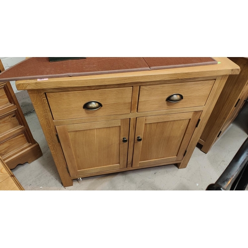 983 - A modern light oak side cabinet with double cupboard and drawers 95x83cm