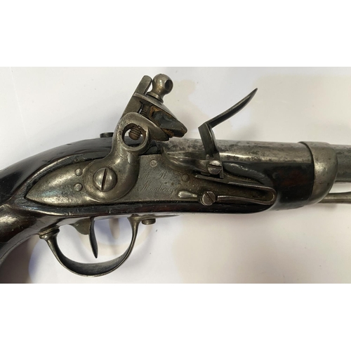 125 - A French Police flintlock pistol, signed on lock plate, length 23.5cm.