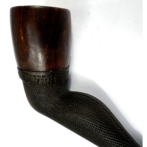 132 - A novelty briar tobacco pipe in the form of a stockinged leg.