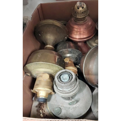 17 - A collection of oil lamp bases and reservoirs.