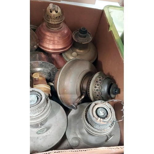 17 - A collection of oil lamp bases and reservoirs.