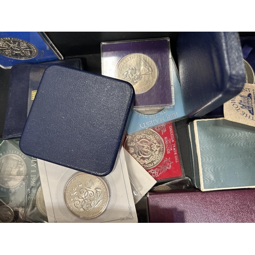 221 - A selection of crowns and other commemorative coins 