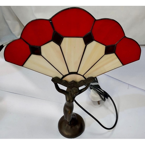 29 - An Art Deco style table lamp with leaded glass shade and decorative metalwork etc