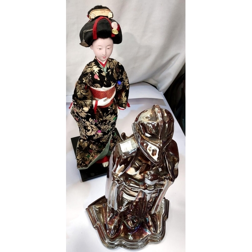 48 - Three costume dolls of Japanese ladies; a 