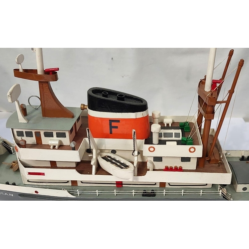 5 - A cased hardwood model ship