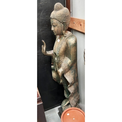 51 - A half life size gilded Buddha figure standing making the sign of peace, ht. 145cm (forearm cracked)