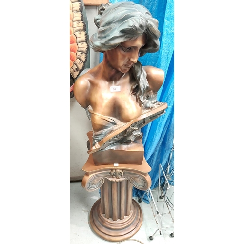 55 - An Art Nouveau style bronzed head and shoulder bust of a young woman on classical column.