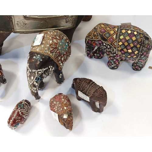 59 - A collection of ornamental elephants.