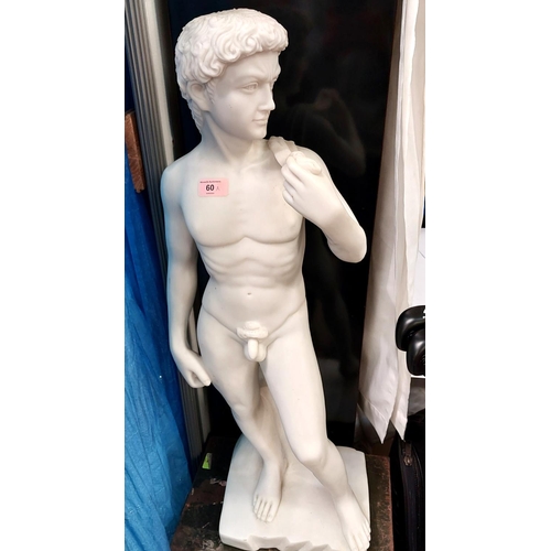 60A - A white marble-effect statue of David, ht. 80cm.