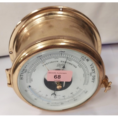 68 - A reproduction Schatz brass cased ships 'Precision Barometer'; a WWI period MKIV telescope with mili... 