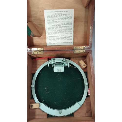 74 - A mid 20th century cased Azimuth Circle, and a cased Polyphon