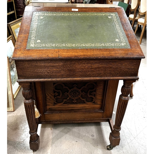 937 - A late 19th Century oak Davenport desk with inset green leather scriber, with four side drawers and ... 