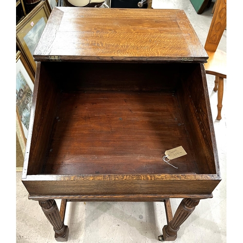 937 - A late 19th Century oak Davenport desk with inset green leather scriber, with four side drawers and ... 