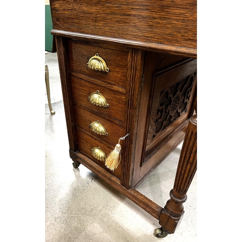 937 - A late 19th Century oak Davenport desk with inset green leather scriber, with four side drawers and ... 