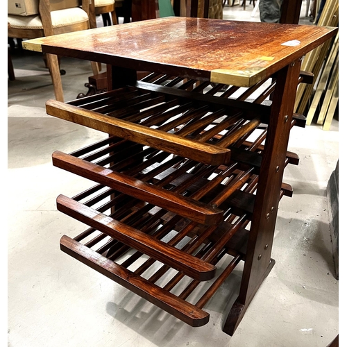 950 - A brass inlaid hardwood vertical magazine rack.