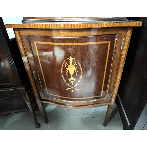 957 - A Sheraton style Edwardian period mahogany display cabinet of elegant narrow proportions, inlaid tro... 