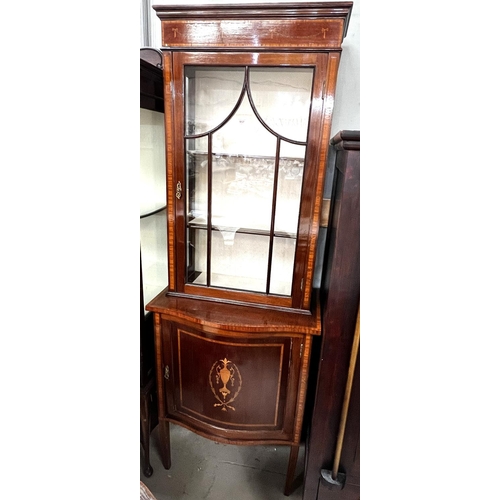 957 - A Sheraton style Edwardian period mahogany display cabinet of elegant narrow proportions, inlaid tro... 