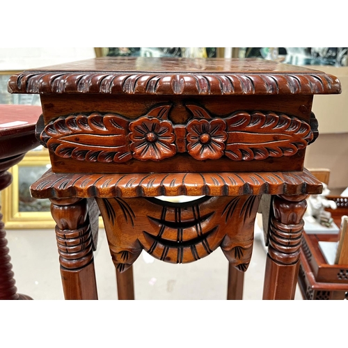 960 - An eastern style carved and gadrooned square top tall plant stand on hexagonal legs, height 106cm; a... 