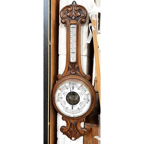 998 - A carved oak anaroid barometer by Shierwater & LLoyd Liverpool (glass a.f)