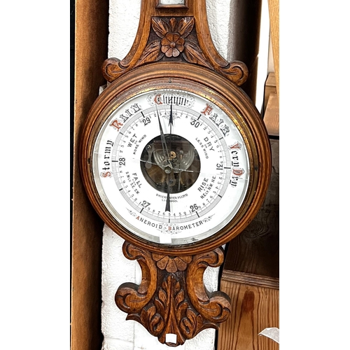 998 - A carved oak anaroid barometer by Shierwater & LLoyd Liverpool (glass a.f)