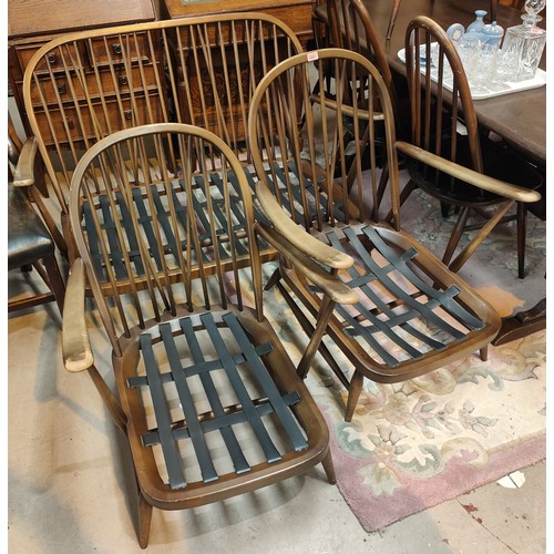 1001 - An Ercol 3 piece hoop and stick back lounge suite comprising of a two seater settee and a pair of ar... 